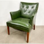 A vintage upholstered armchair.