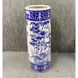 A Chinese blue and white porcelain umbrella stand.