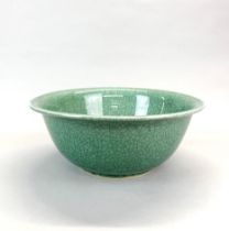 A large Chinese crackle celadon glazed porcelain bowl, Dia. 37cm. D. 15cm.