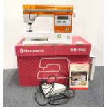 A Husqvarna Viking electric sewing machine.