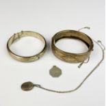 A hallmarked silver bracelet together with a gilt white metal bracelet etc.