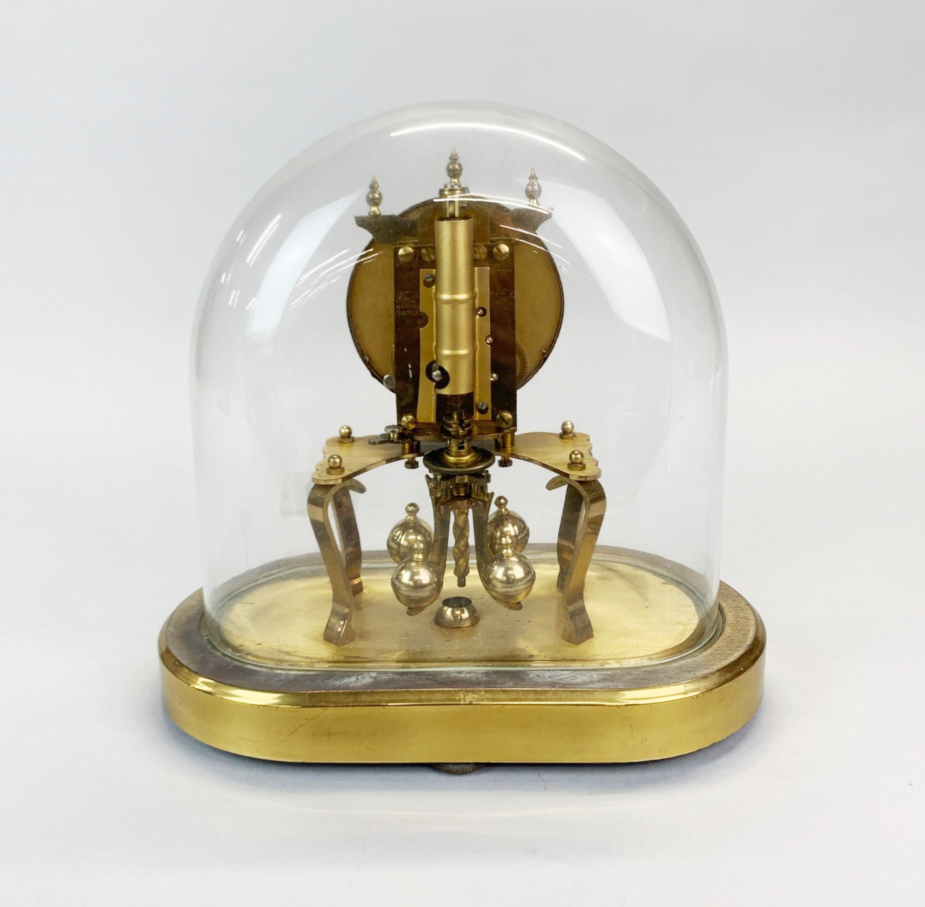 A Kuma mantel clock under glass dome, H.23cm W. 22cm. - Image 3 of 3