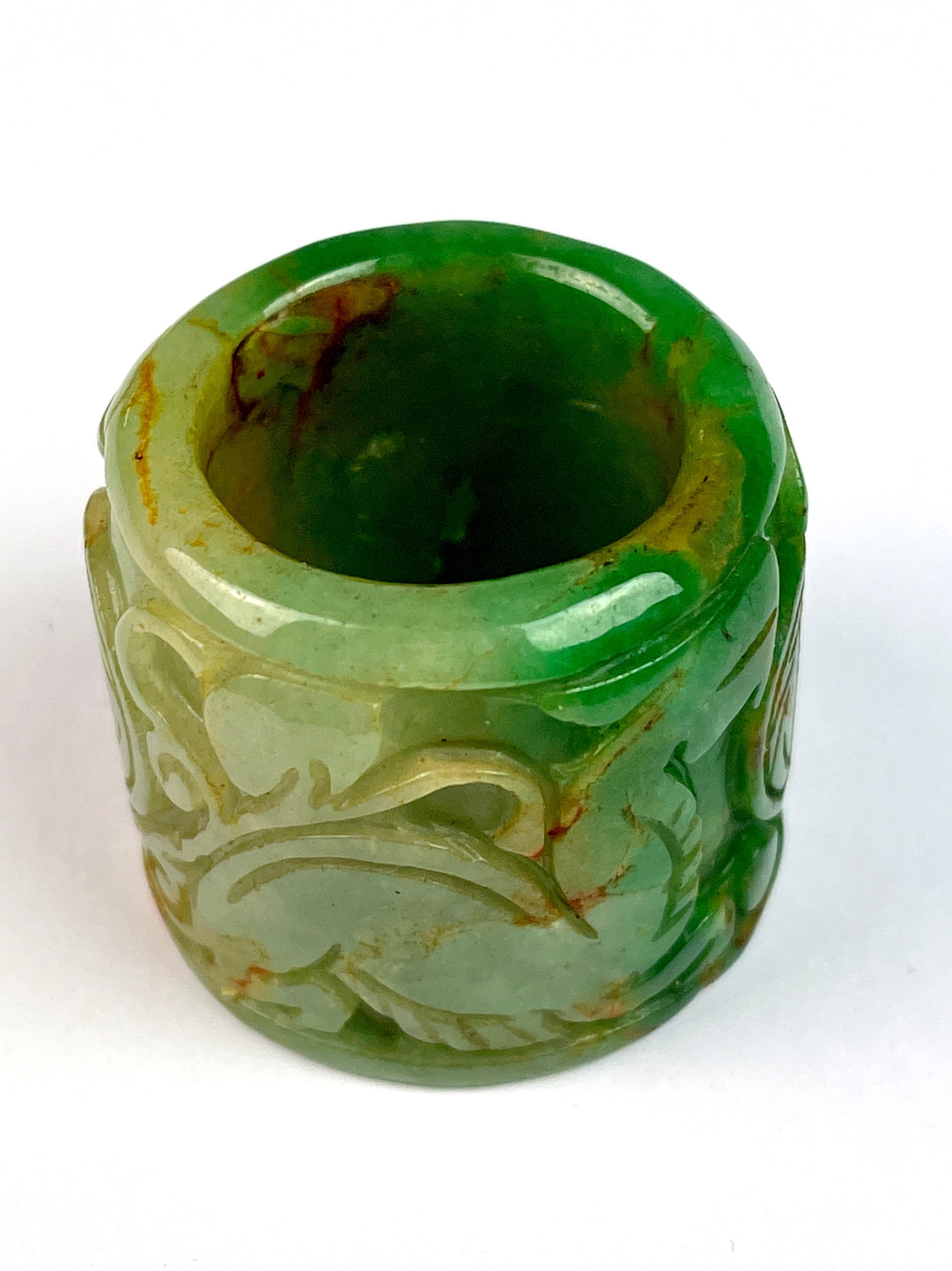 A Chinese carved green jade archer's thumb ring, W. 3cm. - Image 2 of 4