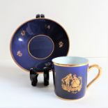 Vintage Limoges Porcelain Cup and Saucer. A beautiful cobalt blue hand painted and gilded cup and
