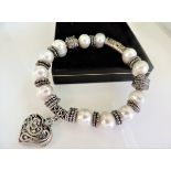 Sterling Silver Cultured Pearl Bracelet. A beautiful bracelet set with 12 x 12mm high lustre