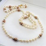 Cultured Pearl Necklace and Bracelet Set. A beautiful cultured pearl necklace with matching bracelet