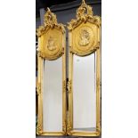 A pair of large gilt framed Rococo style mirrors, 53 x 179cm.