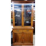 An Edwardian two drawer mahogany bookcase cabinet, missing display shelves and bottom drawer A/F,