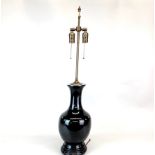 A Chinese black glazed porcelain table lamp, H. 84cm.