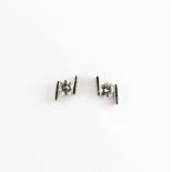 A pair of 18t white gold (stamped 750) diamond set stud earrings, approx. 0.5ct, clarity VS,