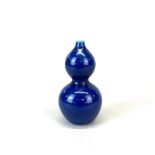 A small Chinese cobalt blue glazed porcelain gourd vase, H. 11cm.