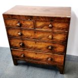 A 20th C oak chest of drawers, one handle detached, 100 x 90 x 45cm.