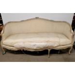 An upholstered French three seater settee, L. 218cm.