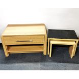 A modern light oak style single drawer TV stand together with a light oak style glass topped nest of