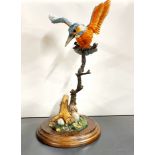 A Country Artists figure of a humming bird, H. 28cm.