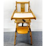 A vintage child's high chair.