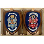 A box containing three handpainted wooden shields, box size 33 x 27 x 22cm.