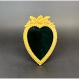 A lovely gilt metal heart shaped photograph frame, H. 19cm.