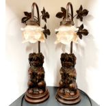 A pair of bronzed resin and glass table lamps, H. 49cm.
