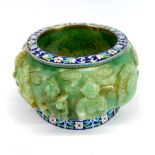 A Chinese carved jade and enamelled silver bowl relief decorated with mythical figures and