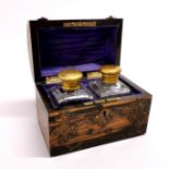A 19th century Coromandel veneered gilt brass bound perfume box with cut glass bottles, 15 x 9 x