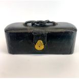 A 19th century French ladies leather covered fitted travelling box, W. 26cm. Hinges replaced and