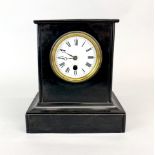 A 19th century French slate mantel clock, H. 24cm.