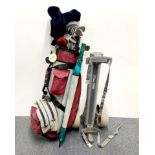 A set of Yonex golf clubs and trolley.