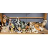 A group of ceramic animal figures and other items.