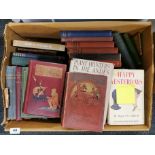 A box of various assorted old novels and non-fiction books, including Daniel De Foes Robinson