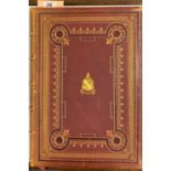 A large leatherbound edition of Idylls of the King by Alfred Tennyson, illustrated by Gustave