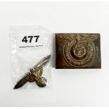 A German Nazi belt buckle and pin.