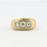 A heavy gent's 14ct yellow and white gold (stamped 14K) ring set with old brilliant cut diamonds, (