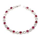 A 925 silver bracelet set with rubies and white stones, L. 19cm.