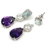 A pair of 925 silver metamorphic earrings set with emerald cut blue topaz and pear cut amethysts, L.