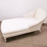 A cream upholstered chaise longue with fitted cushion, L. 150cm H. 76cm.