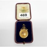 A 9ct gold watch fob.