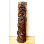 A Chinese carved hardwood tree trunk, depicting a sage, H. 67cm, W. 17cm.