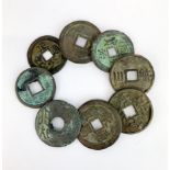 A group of mixed Chinese bronze coins.