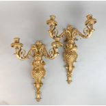 A pair of bronze wall sconces, H. 37cm.