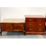 A stained oak chest of drawers together with a further oak sideboard/cabinet with plate glass top,