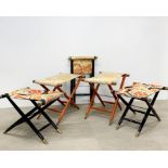 A group of five Japanese lacquered folding stools, largest 52 x 48cm.