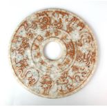 A Chinese carved jade/hardstone pi disc, Dia. 20cm.