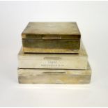 Three hallmarked silver cigarette boxes with engine turned decoration, largest 16 x 9 x 4cm.