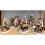 A group of five Capo Di Monte figures of craftsman and a tramp, tallest H. 27cm.