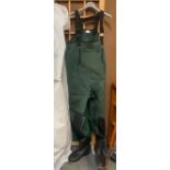 A fisherman's one piece Rapala Prowear fishing suit with size 46/47 boots.