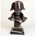 A bronze bust of Napoleon mounted on a black marble base, H. 35cm.