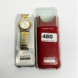 A Swatch silvered and gold plated wrist watch with a ladies gold plated coin watch and a gents