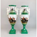 A pair of 20th century porcelain vases depicting hunting scenes H. 47cm.