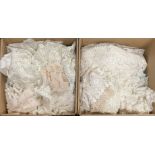 Two boxes of linen and lace.